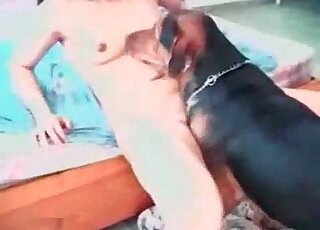 Hot zoophile bitch gets her pussy licked by a doggie