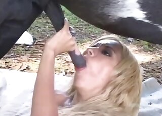 Blonde whore fits giant horse dick in the ass for ruthless anal
