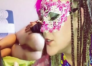 Masked cutie practicing her oral skills with a black dog that fucks