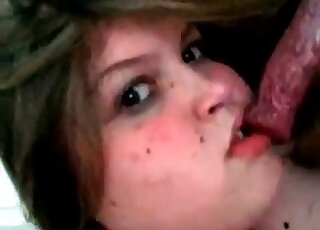 Chubby slut loves performing a blowjob to her dog during bestiality video