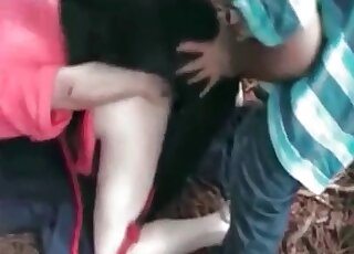 Zoophile dressed in pink fucks a big-dicked dog in an outdoor movie