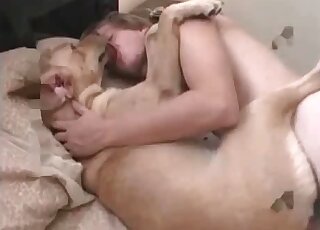 Horny zoophile dude fucks his nice submissive dog in the bedroom