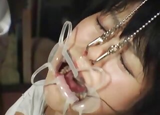 Asian babe in a porn video with insects